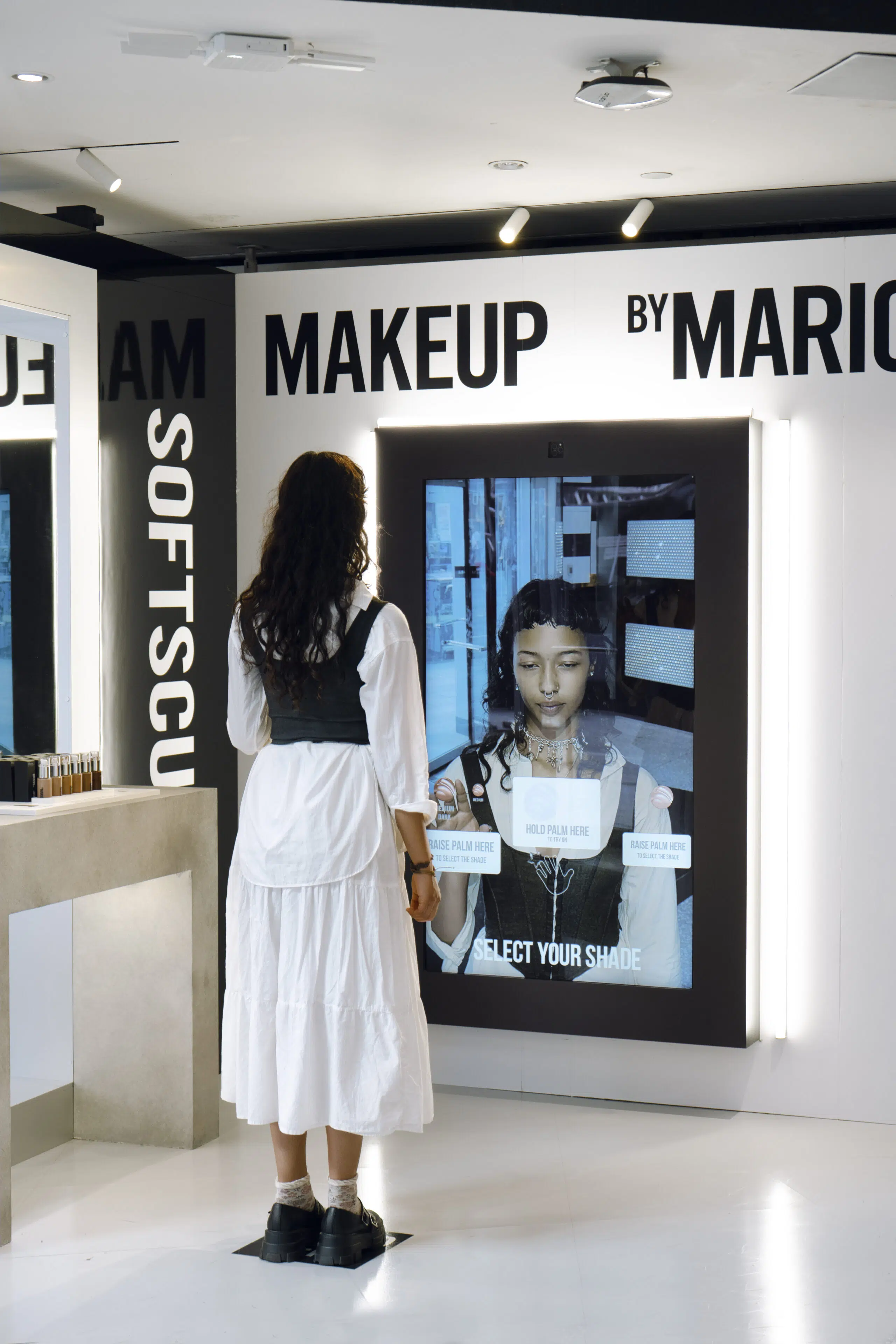 Girl using Makeup by Marion AR Mirror